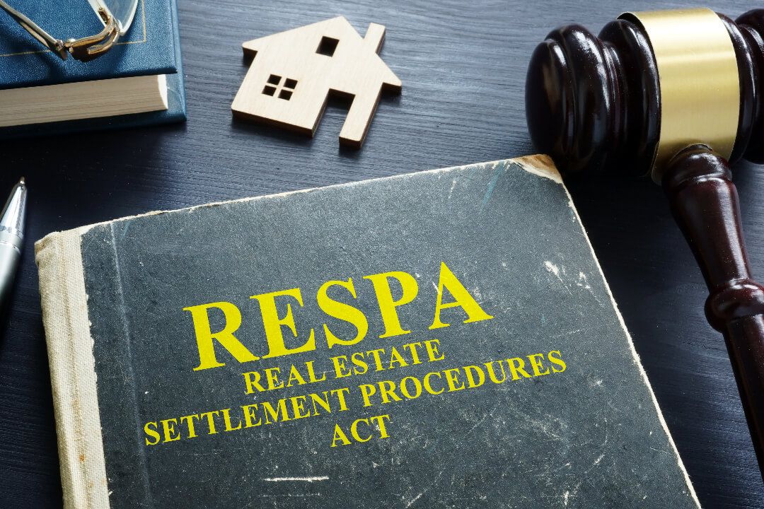 RESPA Real Estate Settlement Procedures Act book with a gavel and house